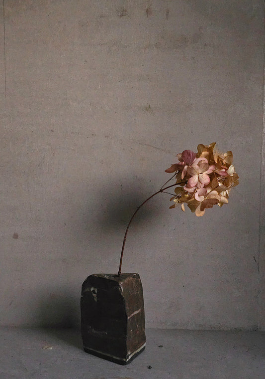 Primal Triangle Vase – Brown Glaze with White Markings on Black Clay | Rustic Sculptural Weighted Ceramic Vase