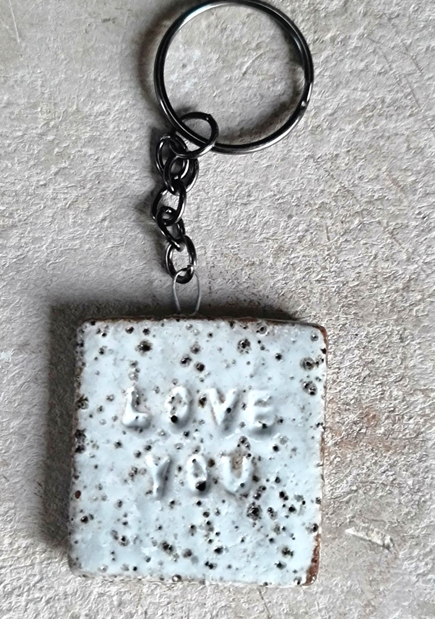 handcrafted rustic ceramic stoneware square key rings embossed LOVE YOU