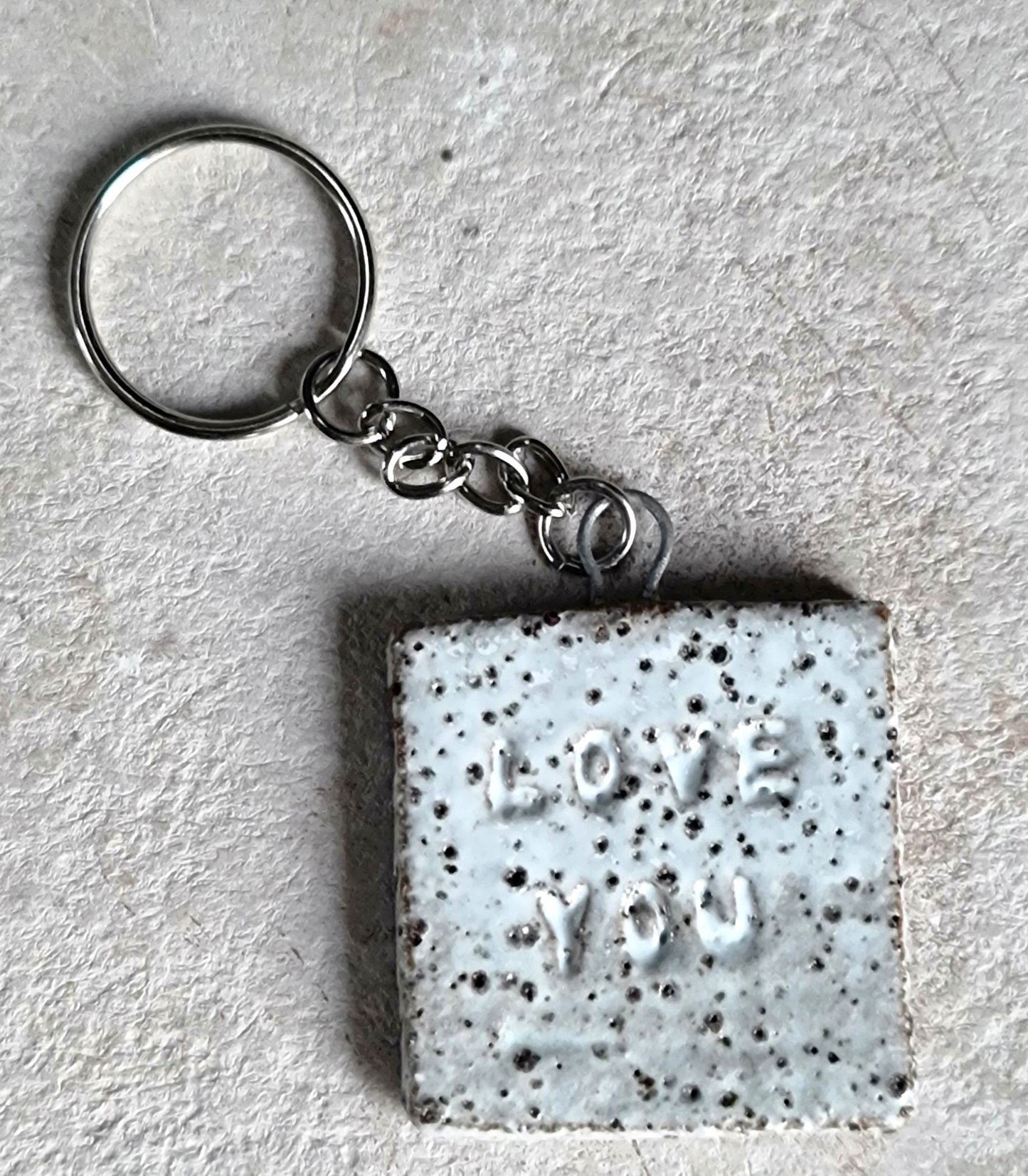 handcrafted rustic ceramic stoneware square key rings embossed LOVE YOU