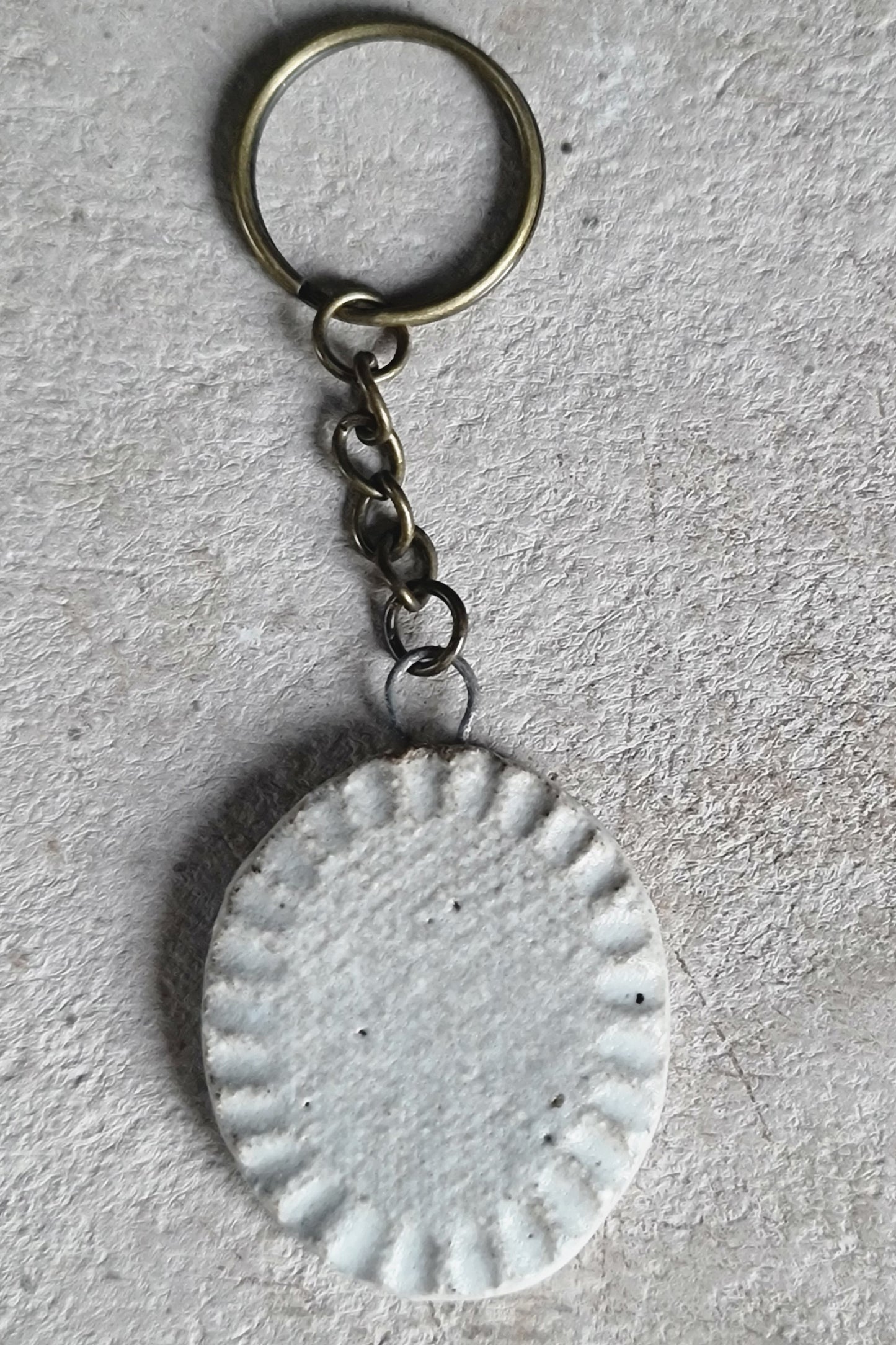 handcrafted creamic oval key rings