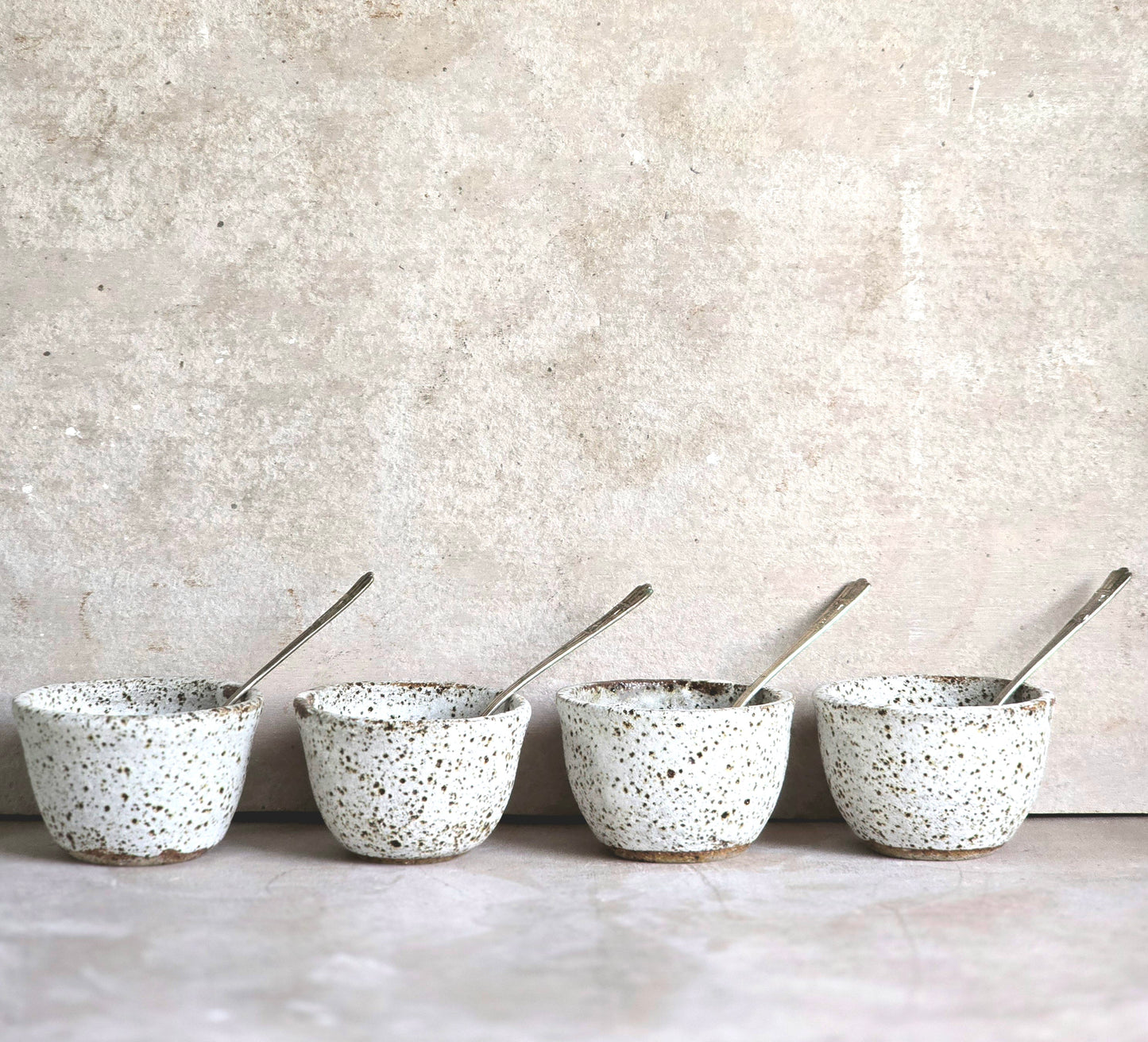 speckled white ceramic bowls