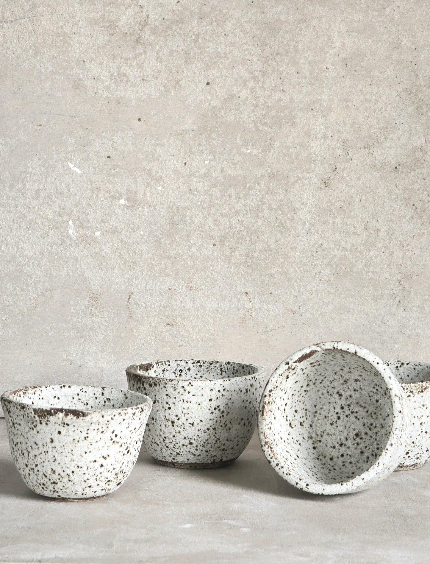 speckled white ceramic bowls