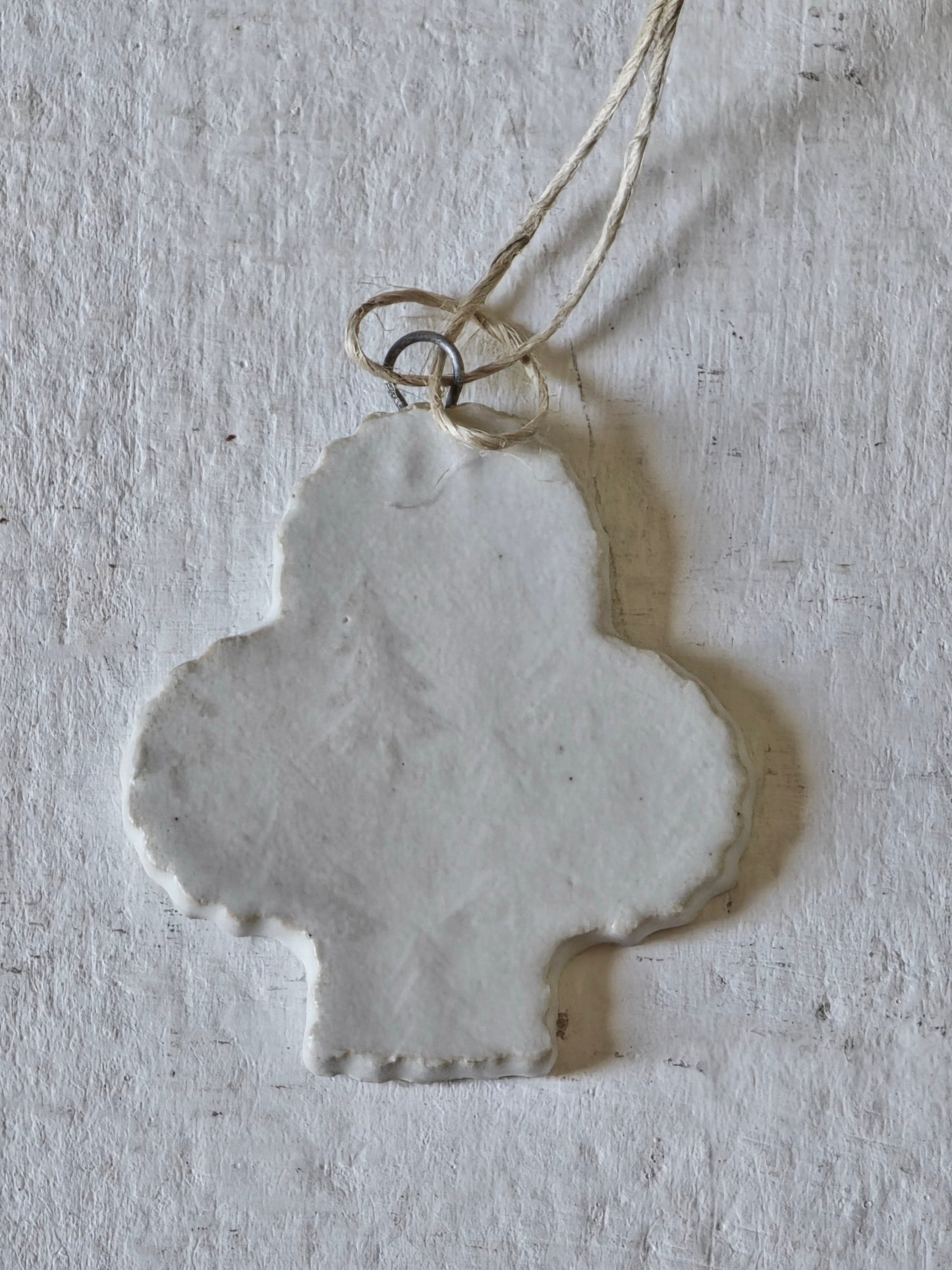 white embossed Christmas tree decorations