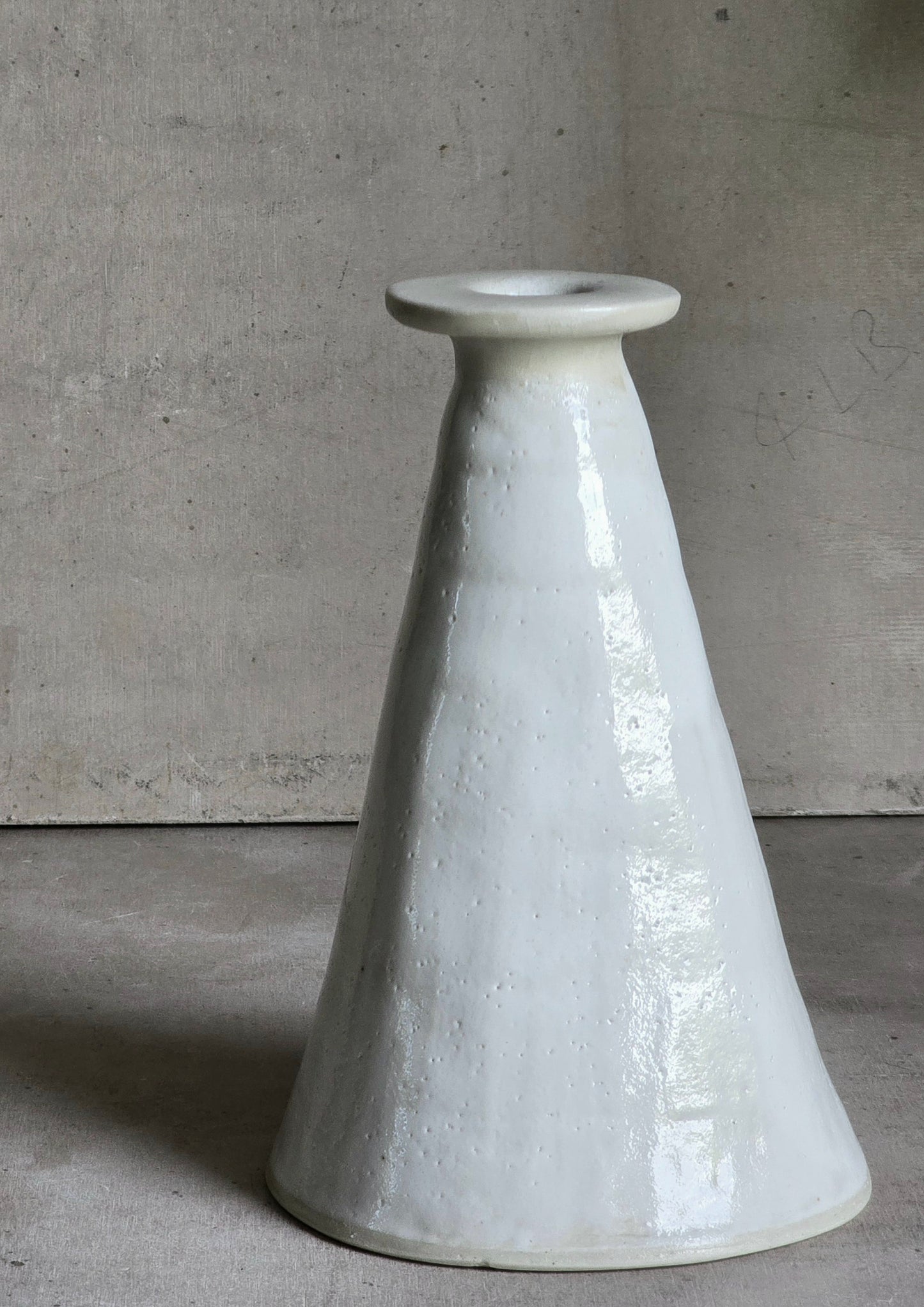 a minimalistic white vase