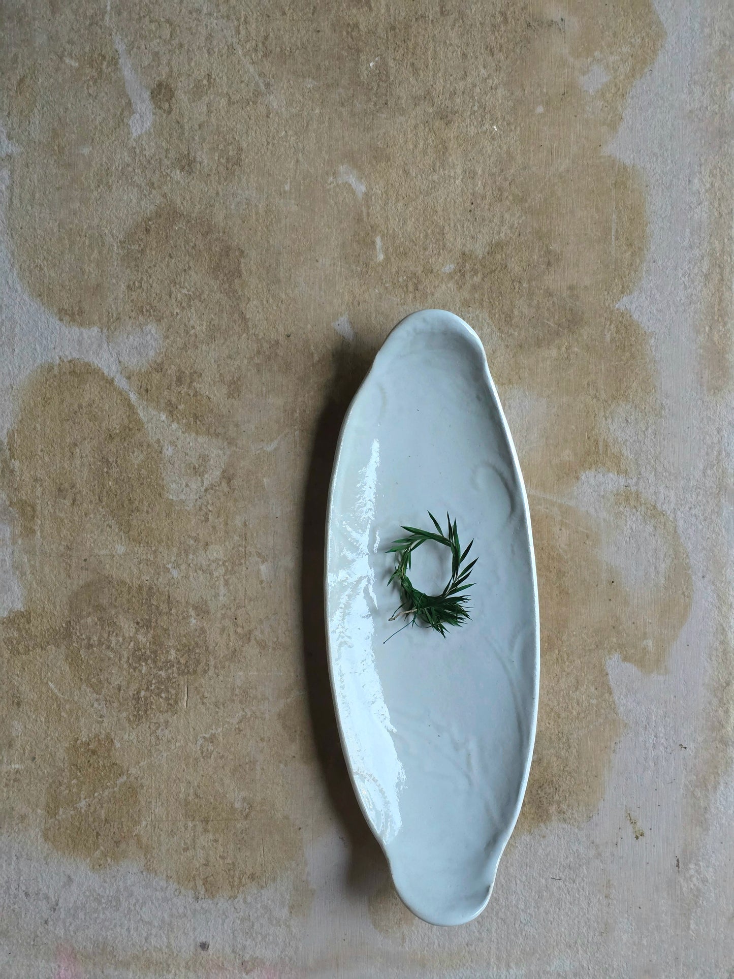 :
Handcrafted Boat-Shaped Floral Embossed Serving Platter | Glossy White Ceramic | Elegant Timeless Serveware