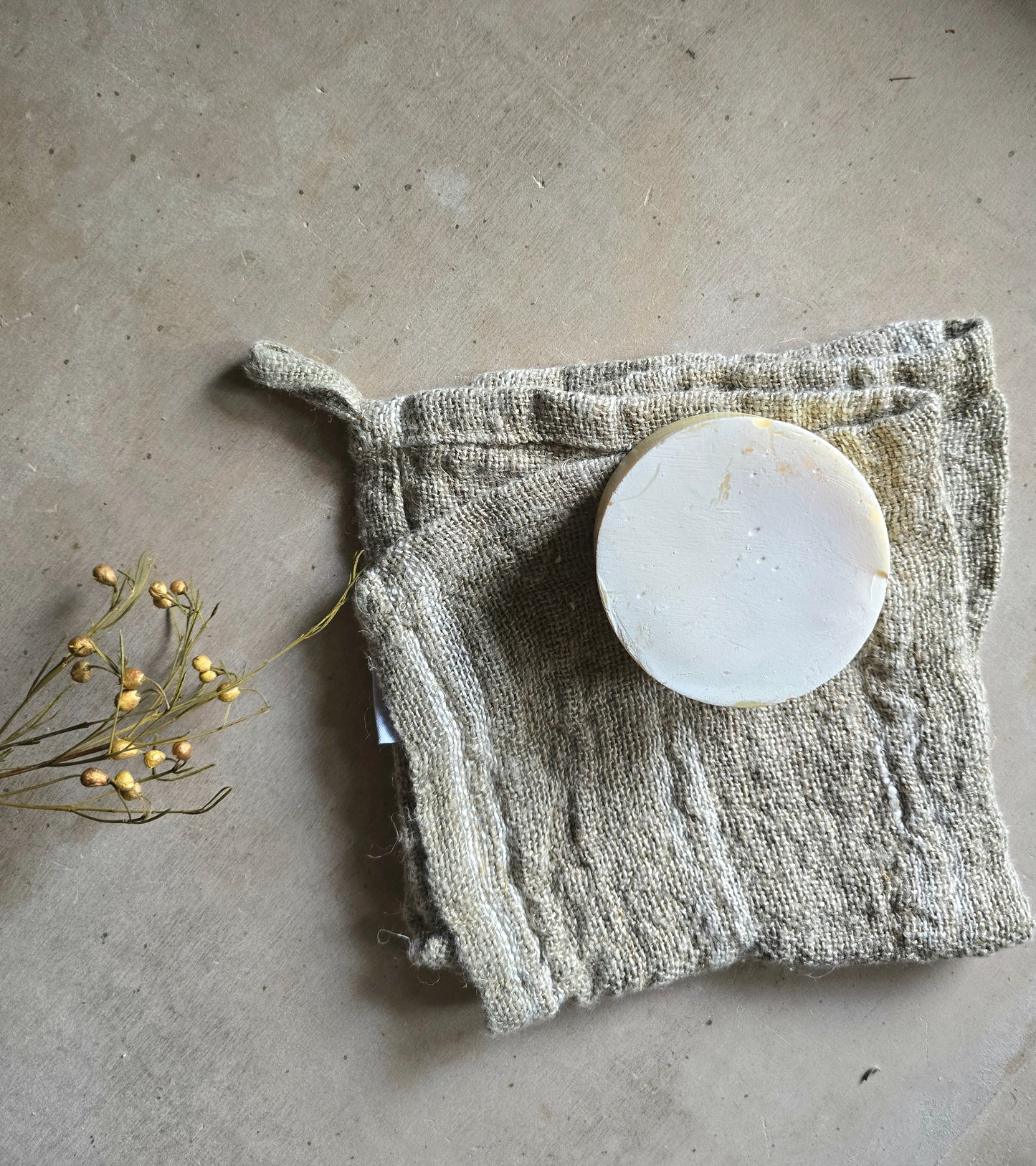 rustic handloomed 100% Linen Wash Cloth with white stripes and a loop to hang.